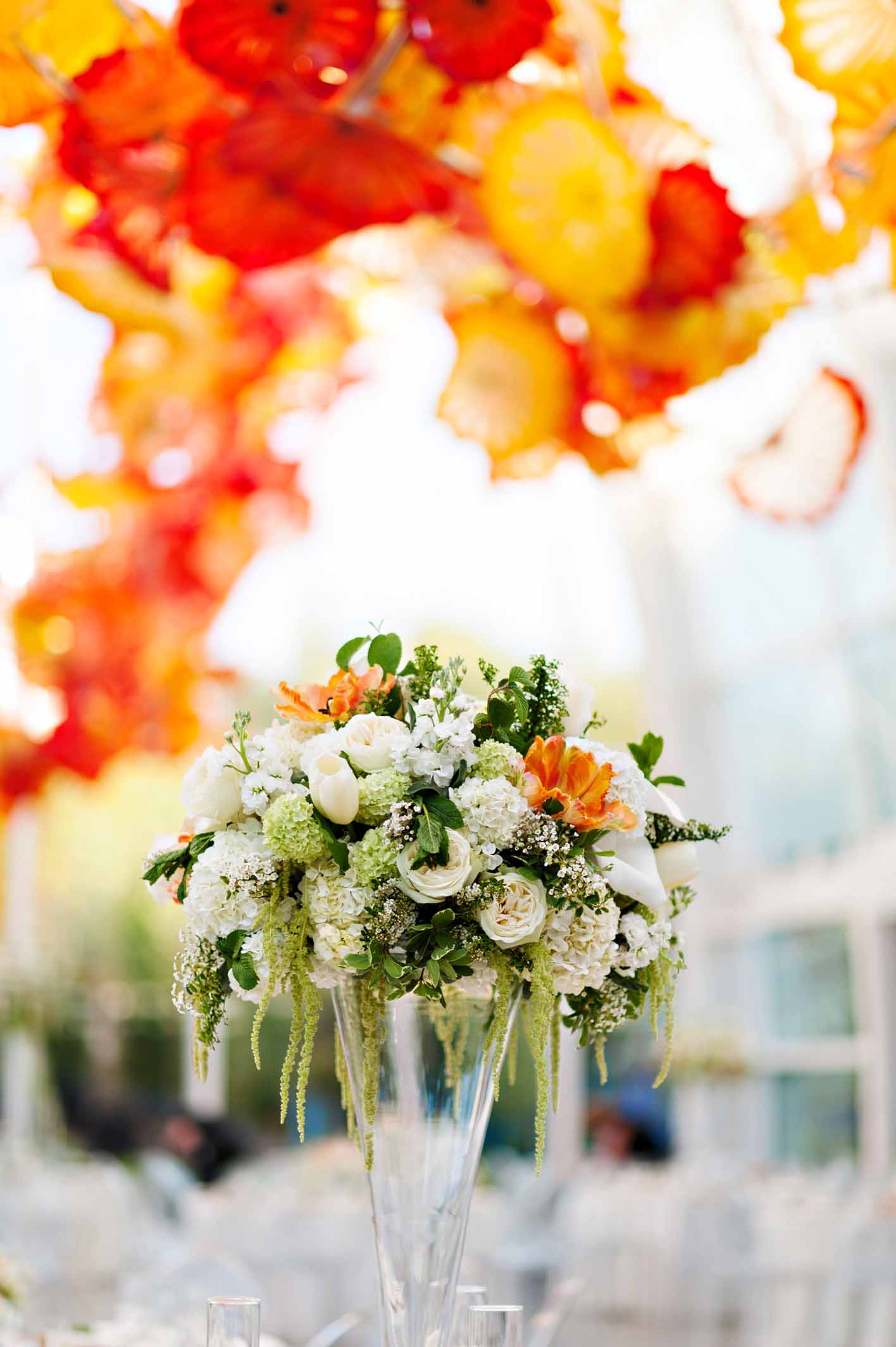 Large spring flower arrangement at Chihuly Garden and Glass wedding - designed by Flora Nova Design