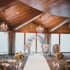 Flora Nova Design Seattle - Luxurious Winter Wedding at the Edgewater Hotel. White and Grey Ceremony Arch with Phalaenopsis Orchids