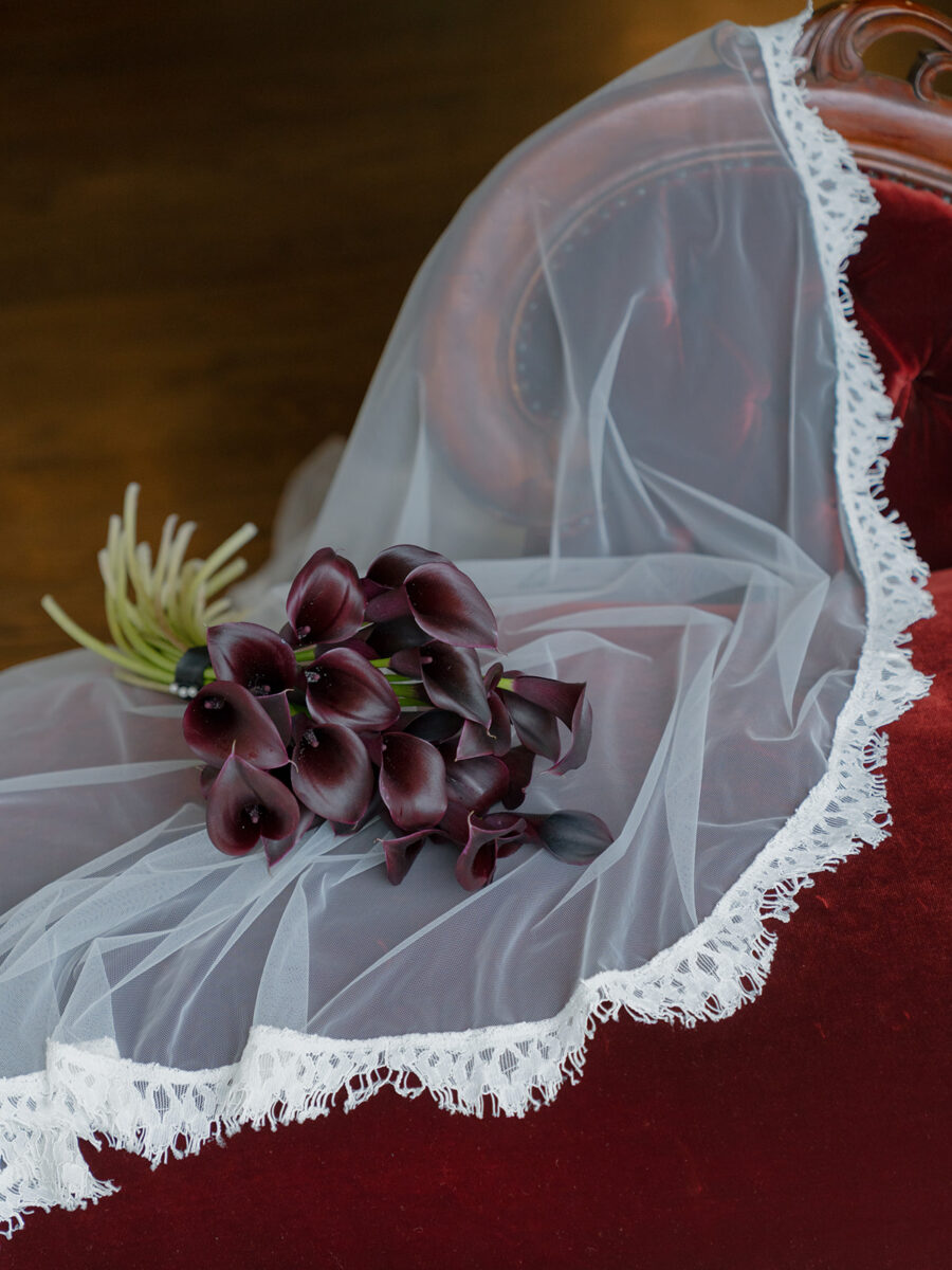 Red Chateau Lill Wedding by Flora Nova Design offered stunning dramatic details like a deep burgundy all mini calla lily bouquet