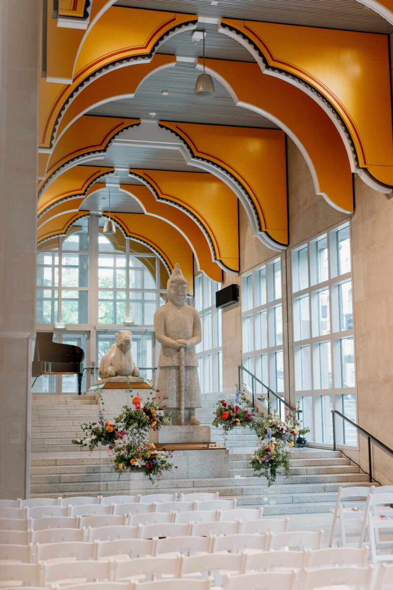 Modern stairs at Seattle Art Museum decorated with colorful floral pieces.